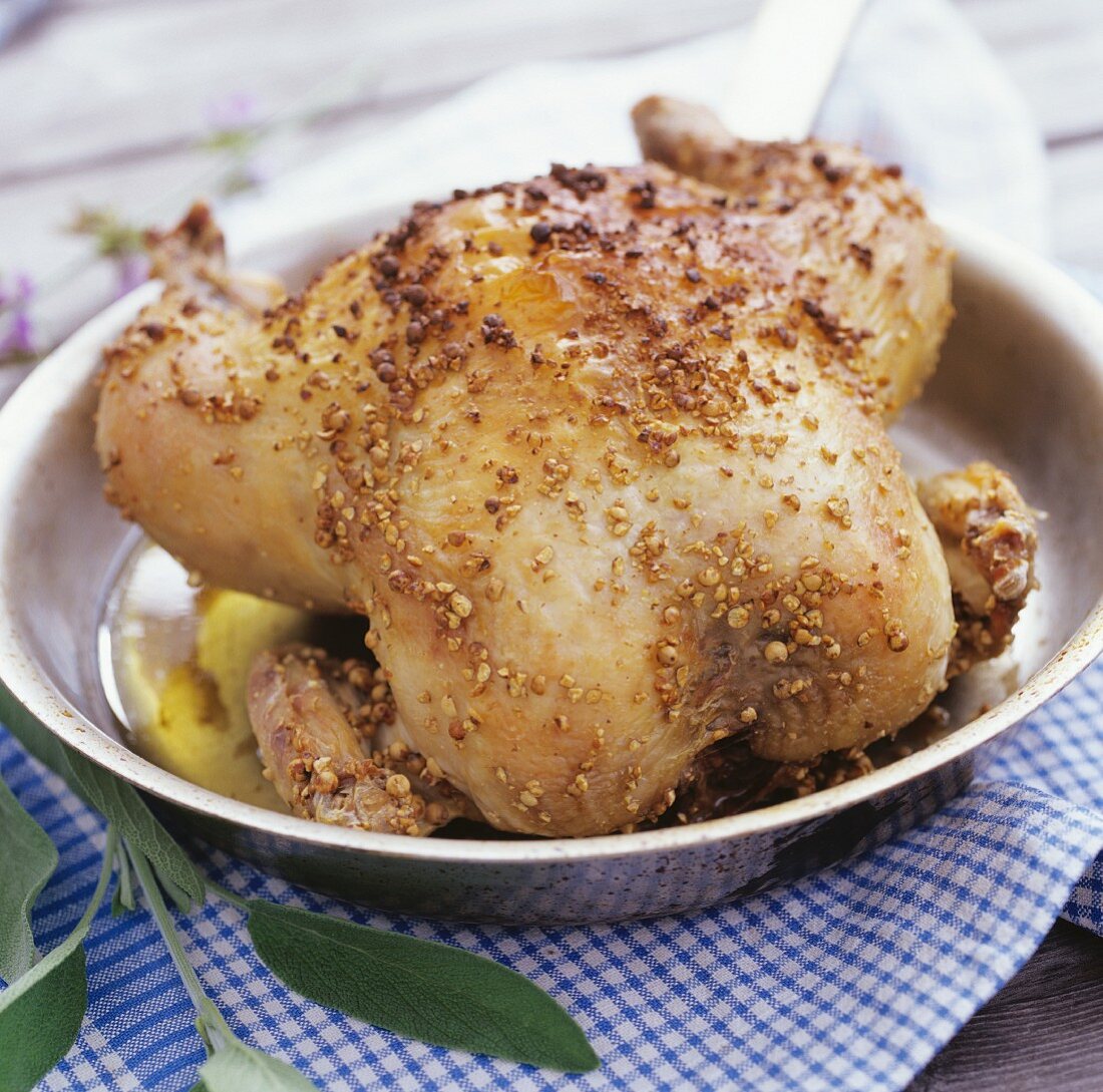 Crispy roast chicken in a pan