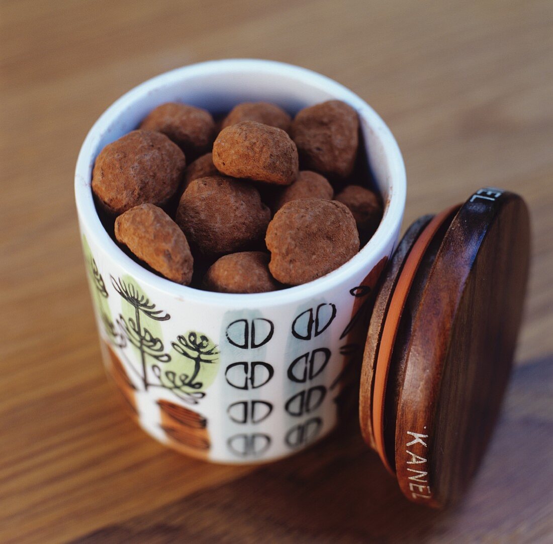 Cinnamon truffles in a storage container