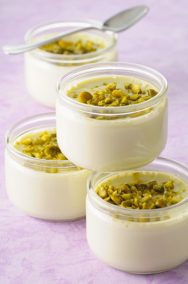 Pistachio mousse in several glass pots