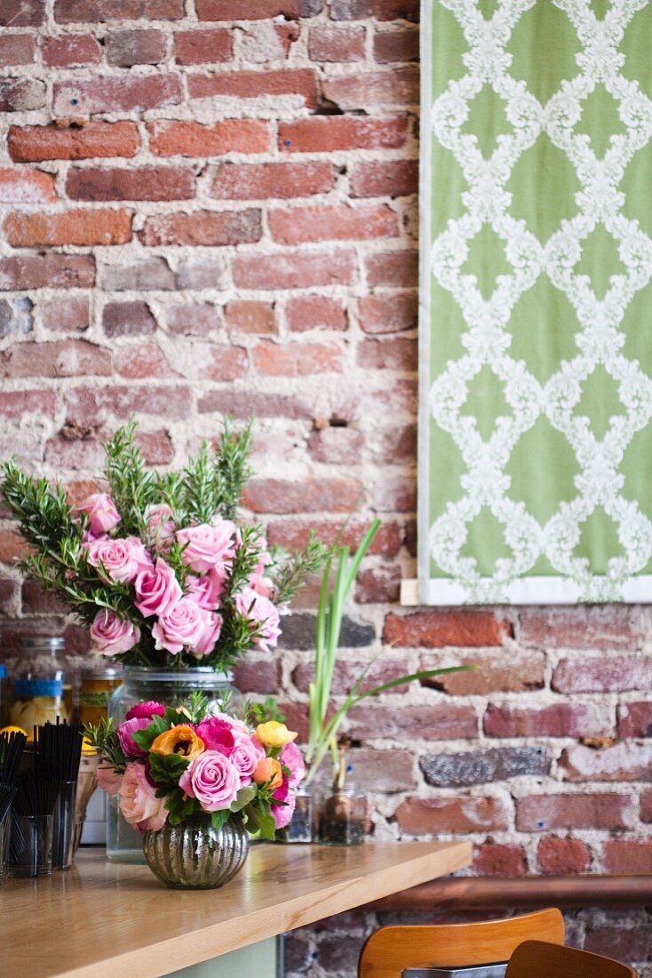 Pretty Rose Arrangements on a Table