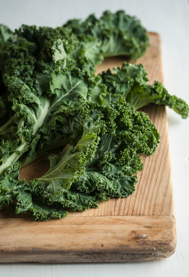 Fresh kale on a chopping board