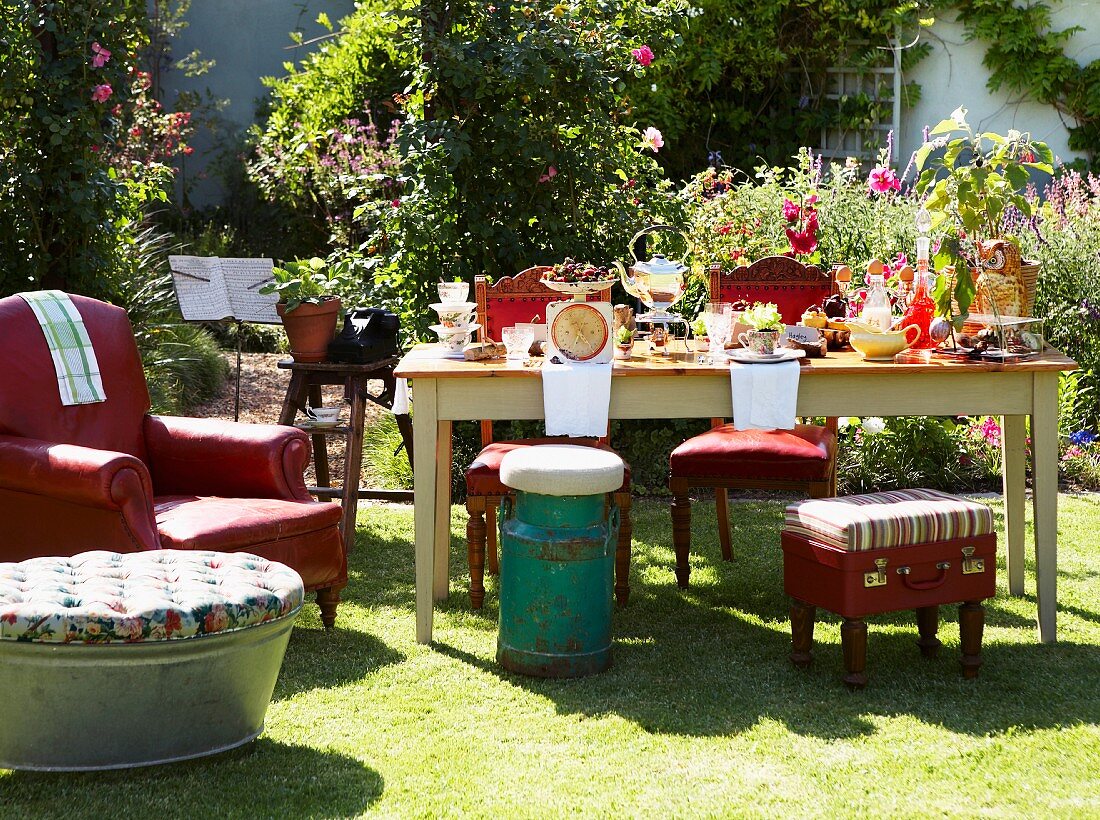 Set table and various seating in summer garden