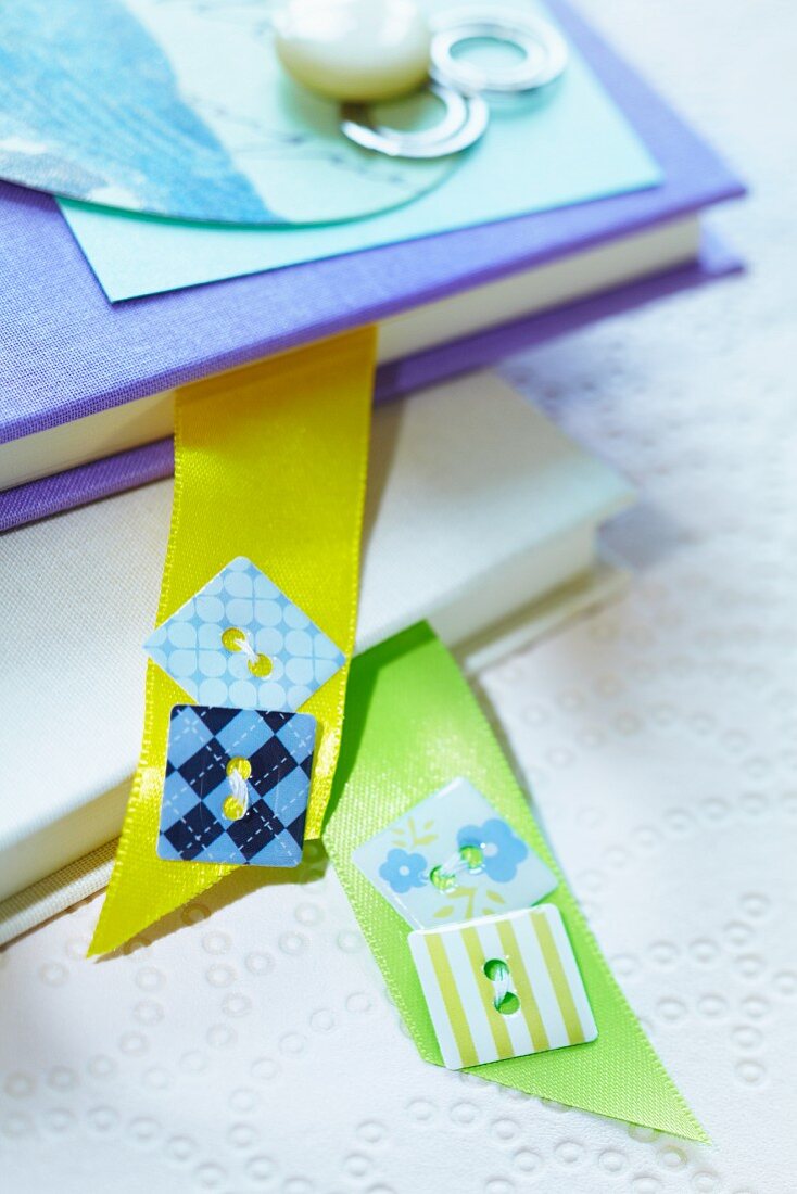 Bookmarks decorated with square buttons