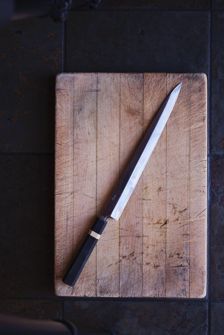 A Knife on a Cutting Board