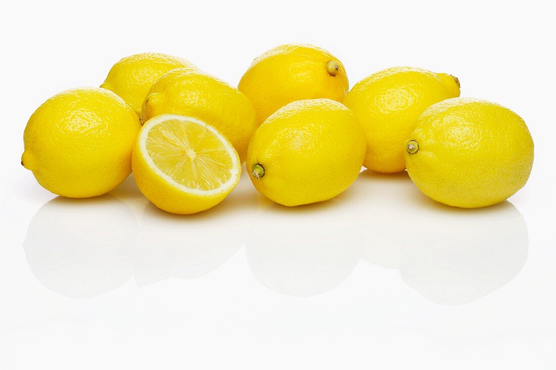 Several whole lemons and one half lemon