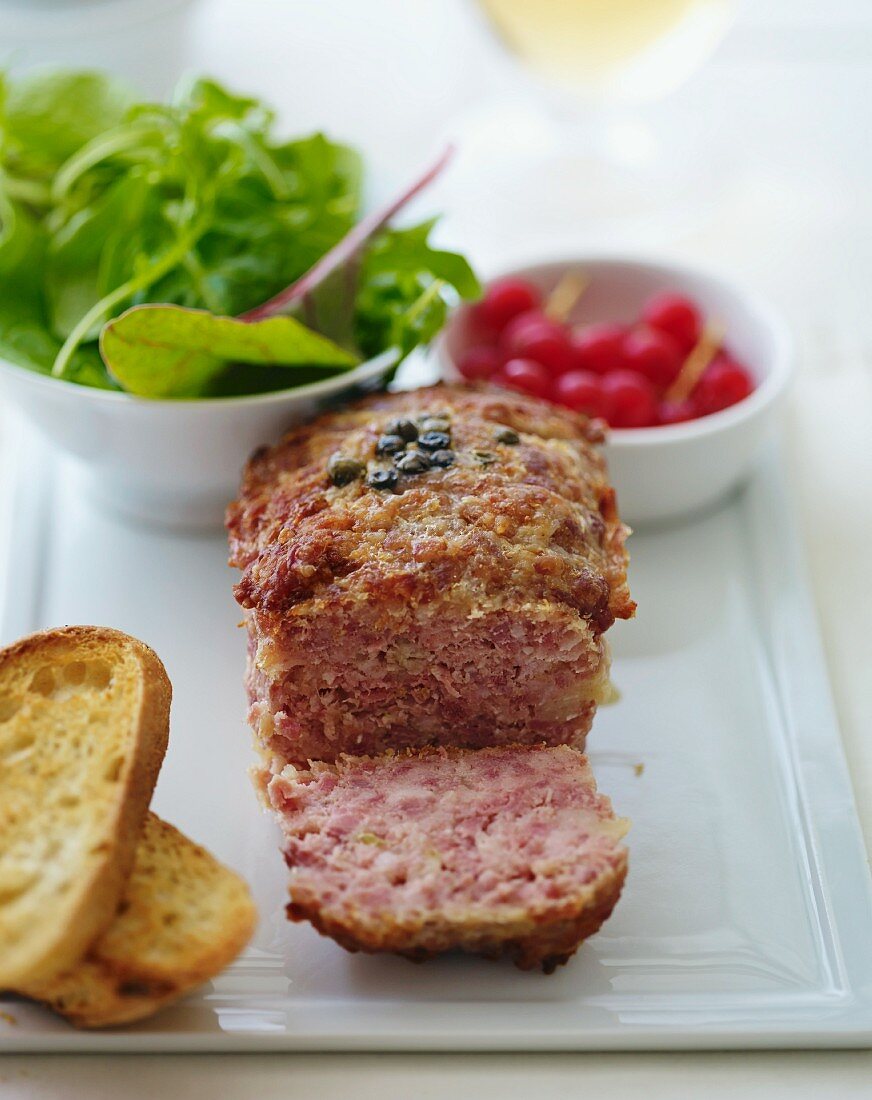Duck terrine with salad and redcurrants