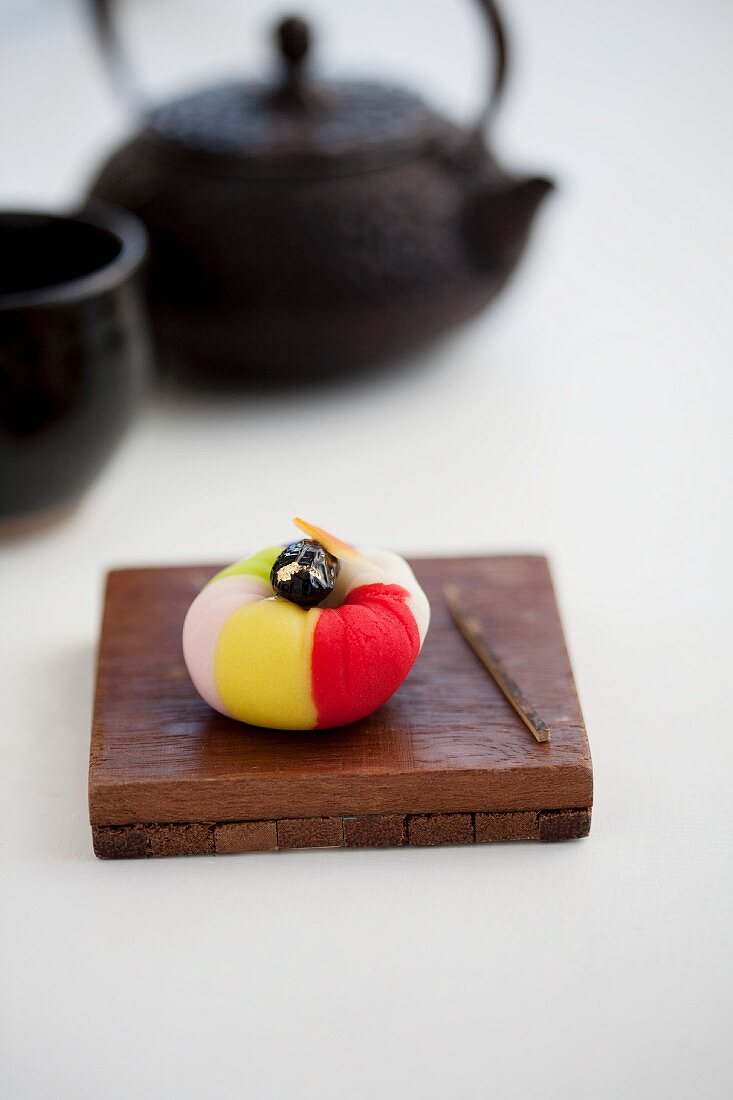 Wagashi camellia with a pot of tea (Japan)