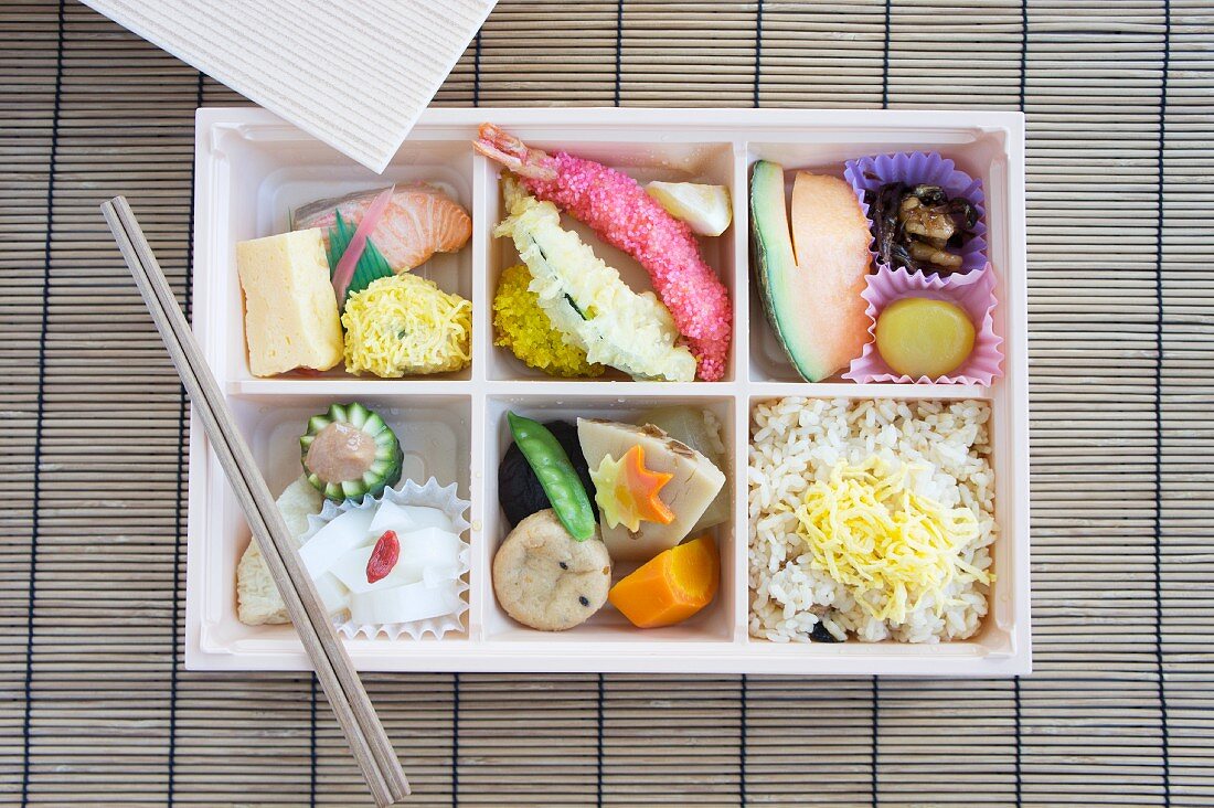 Bento box with fish, tempura, rice etc. (Japan)