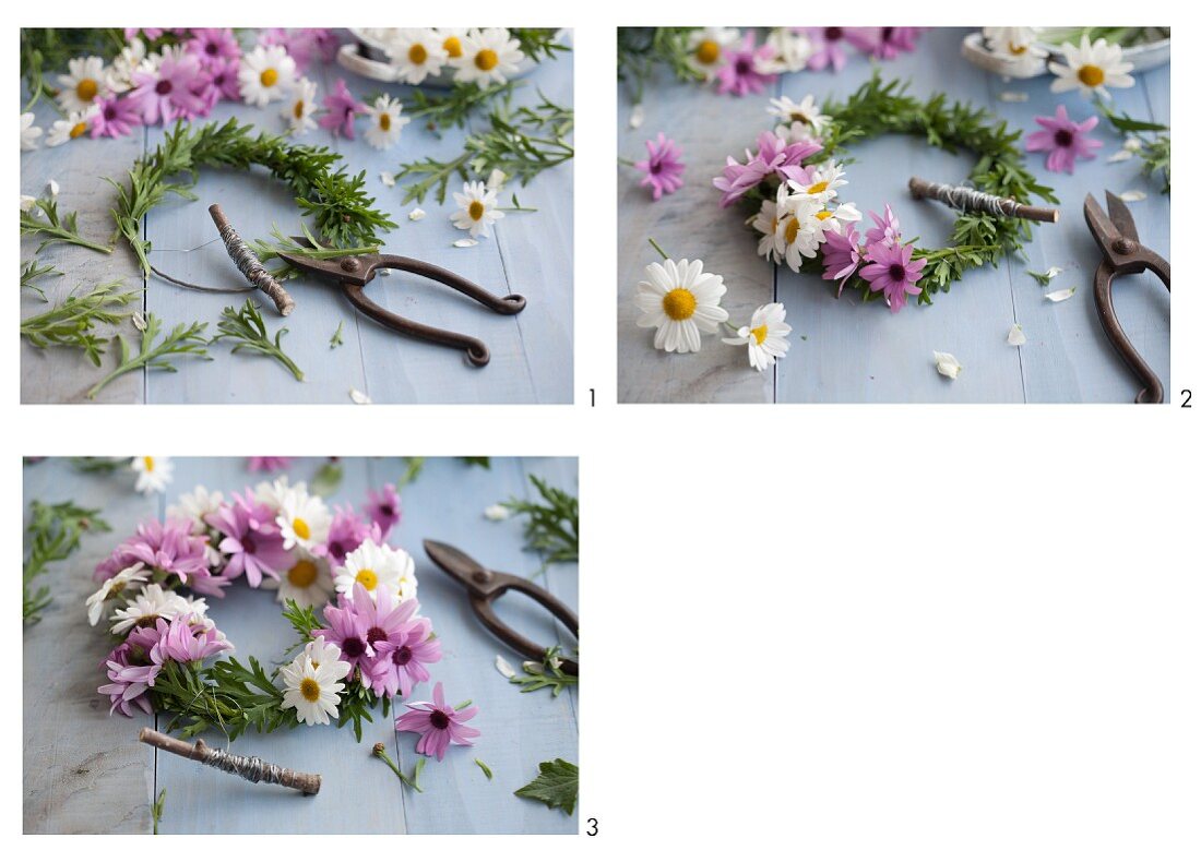 Hand-tying a wreath of pink and white daisies