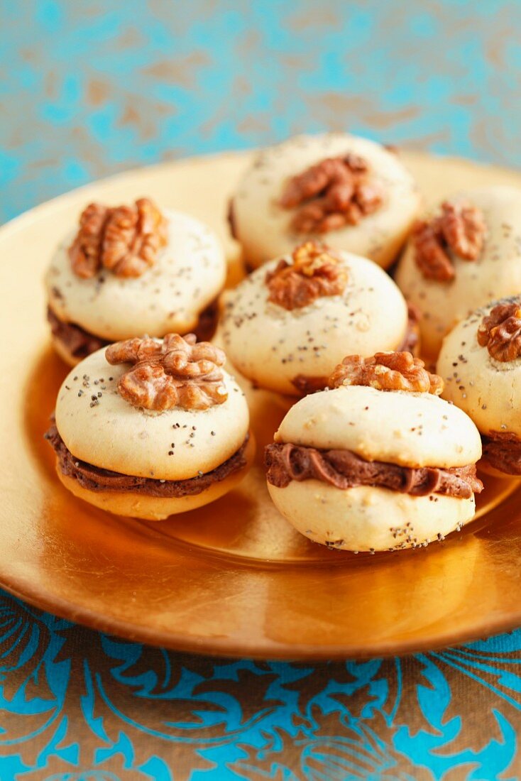 Walnut meringues with chocolate filling, for Christmas