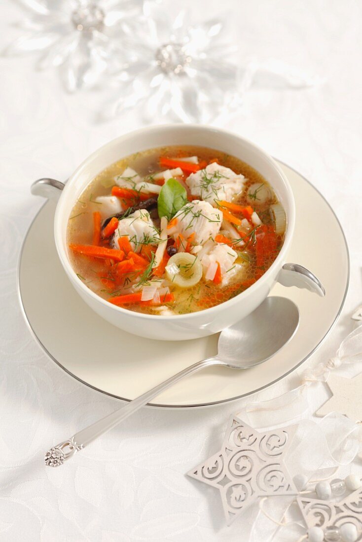 Christmassy vegetable soup with cod