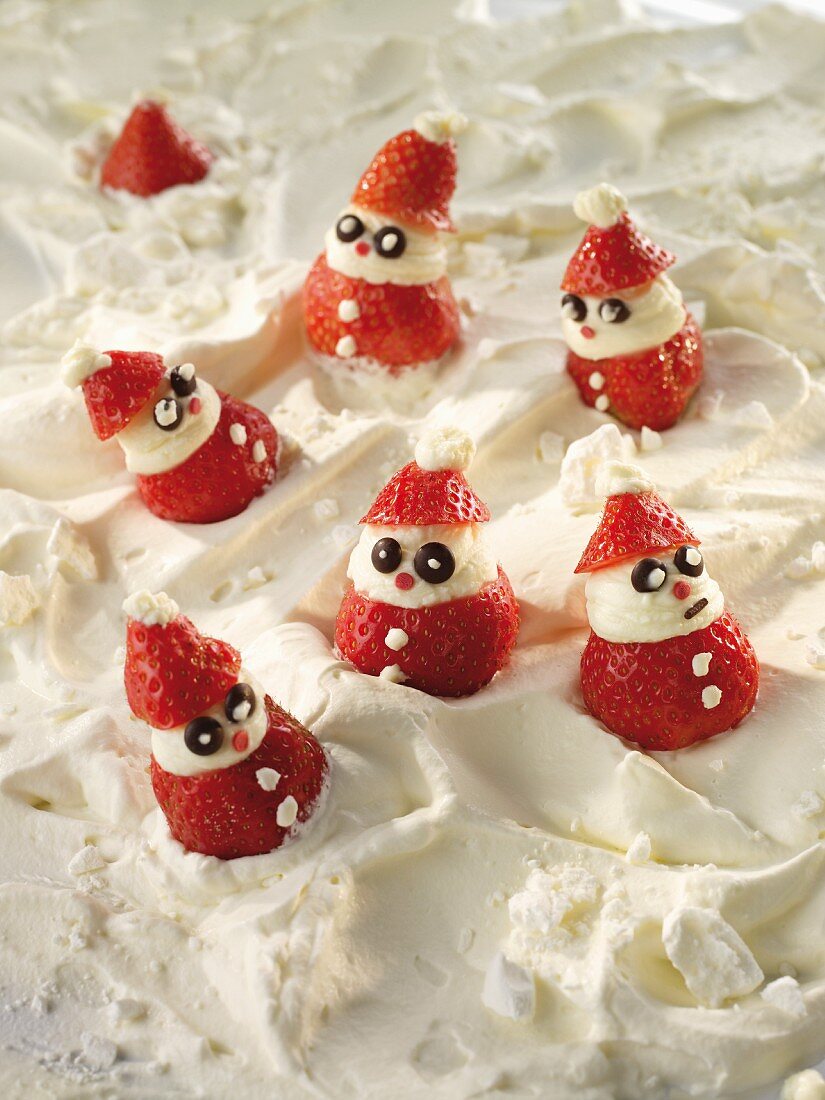 Strawberry Father Christmases on meringue snow