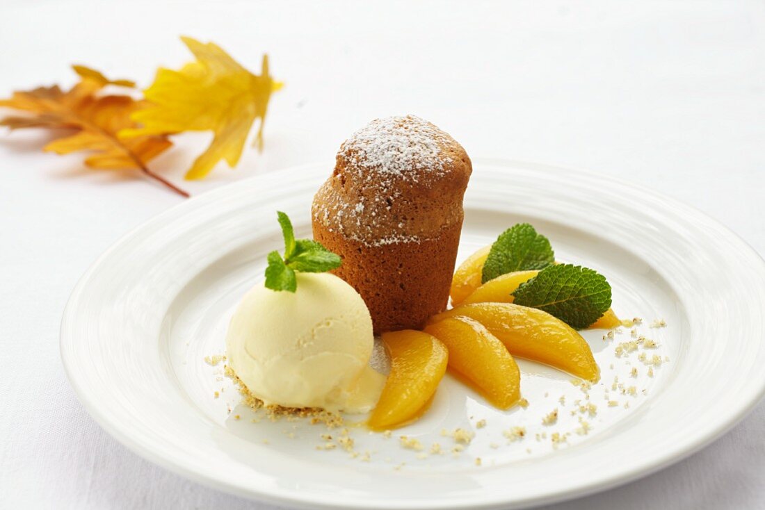 Nut soufflé with pear wedges and vanilla ice cream