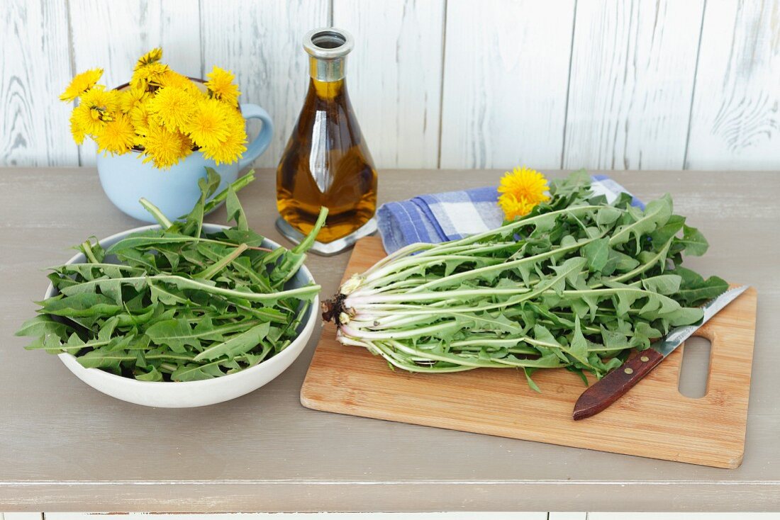 Fresh dandelions and olive oil
