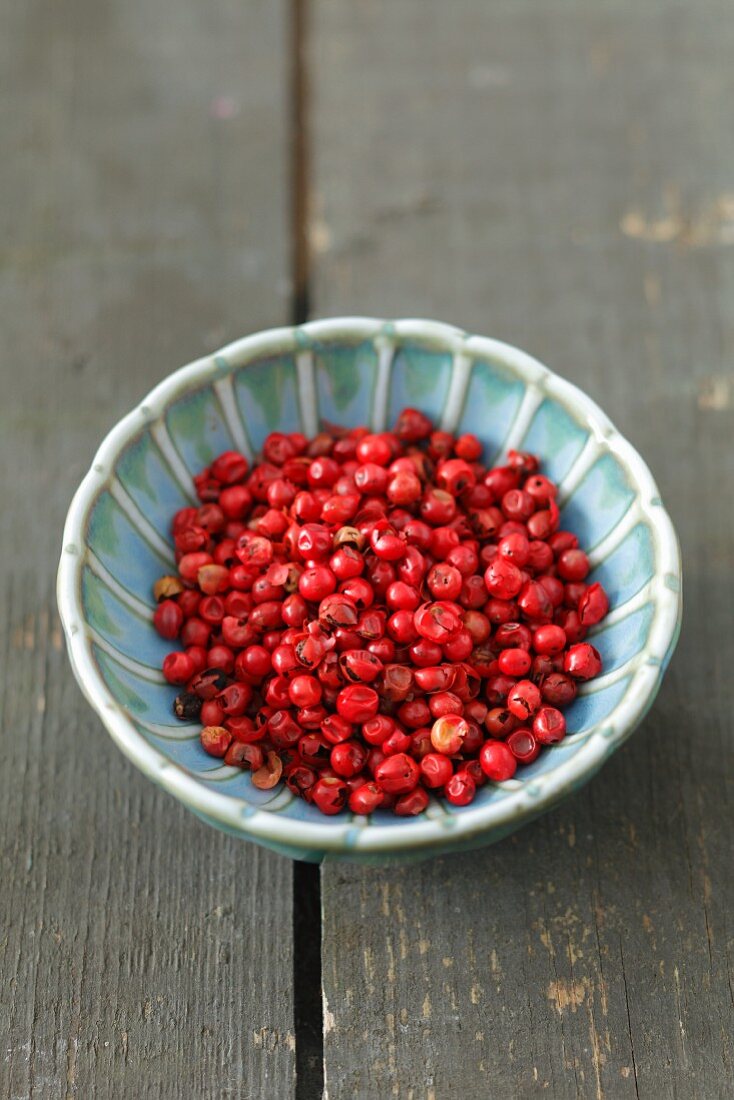 A bowl of red peppercorns