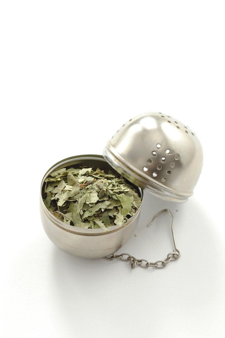 Dried birch leaves in a tea ball