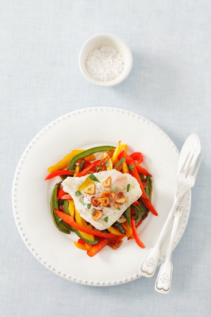 Steamed cod on a pepper medley