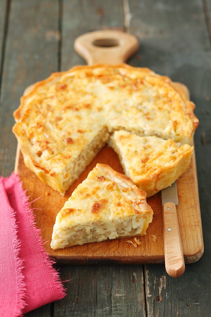 Onion quiche, partly sliced