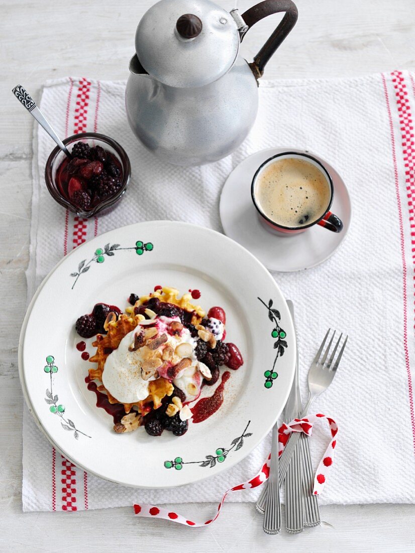 Waffles with berry compote, served with coffee