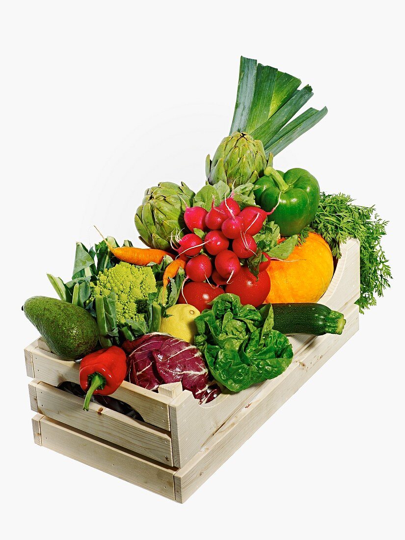 Summer vegetables and lettuce in a crate