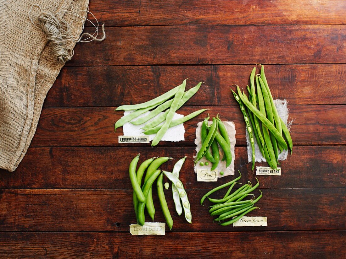 Assorted varieties of green beans and peas