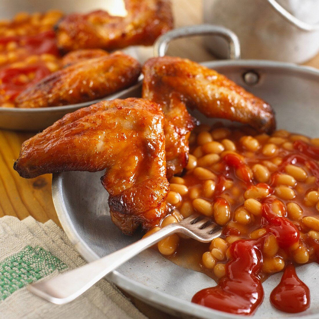 Chicken wings with baked beans for Halloween