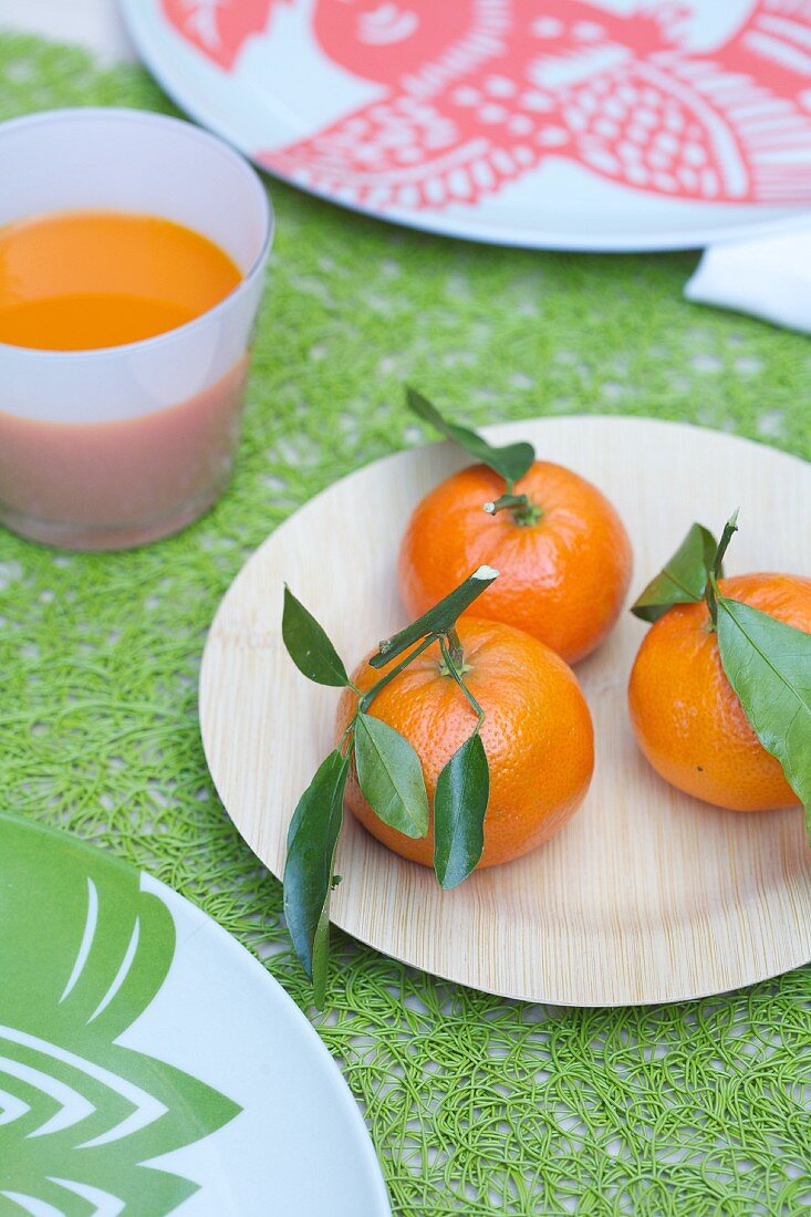 Mandarin Oranges and a Glass of Carrot Juice