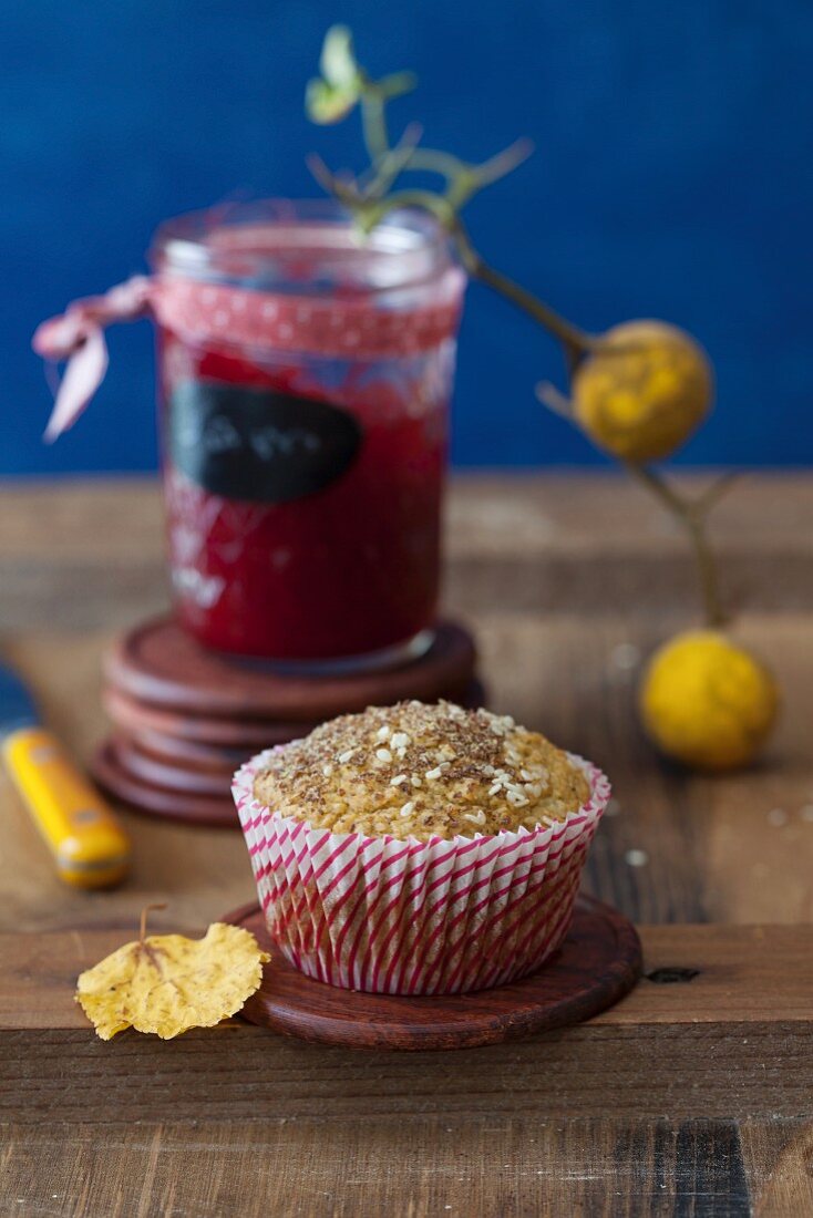 An Oat Muffin with a Jar of Jam