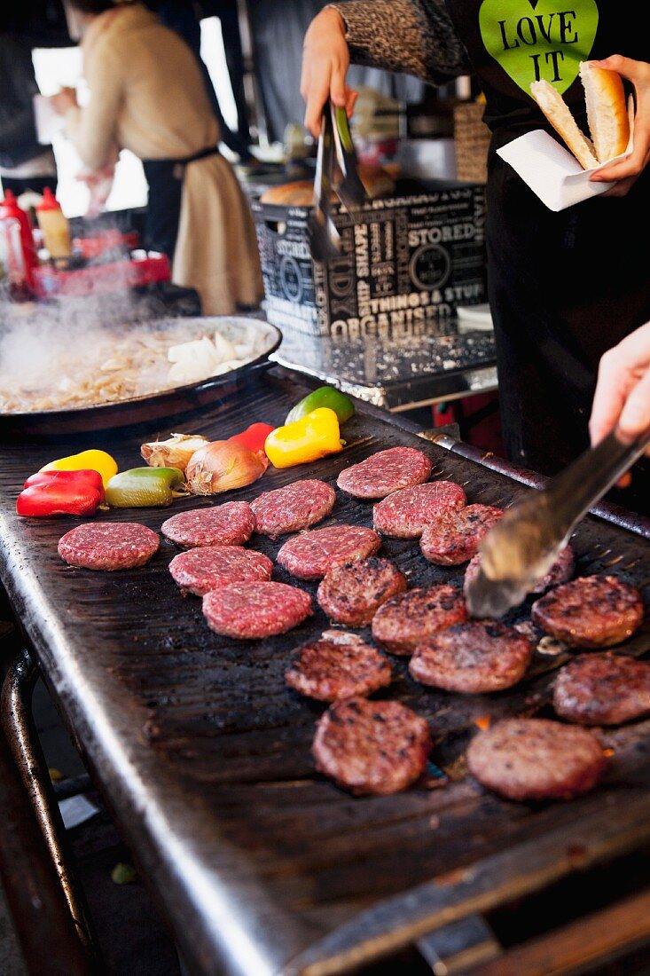 Burgers on the grill at a restaurant