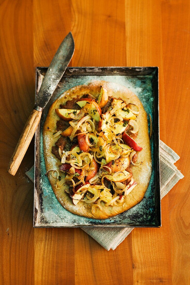 Flatbread topped with apple and liver sausage