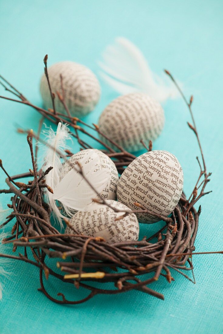An Easter nest with paper-clad Easter eggs