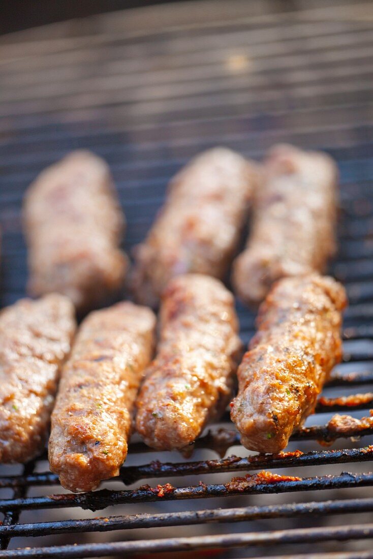 Kebapche (grilled minced meat, Bulgaria) on the barbecue