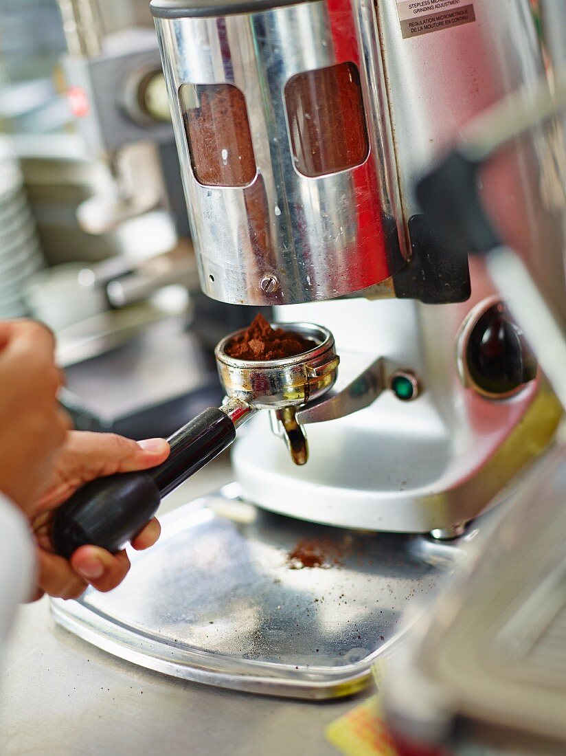 Coffee being ground for espresso