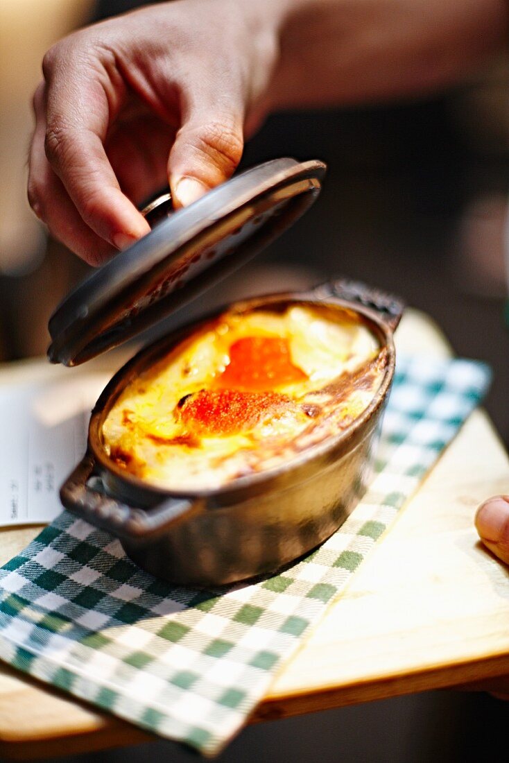 Potato gratin in a small casserole dish