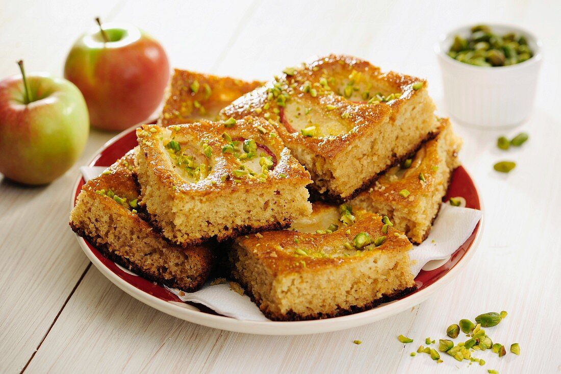 Slices of delicious Whole-Wheat Apple Cake with Pistachios