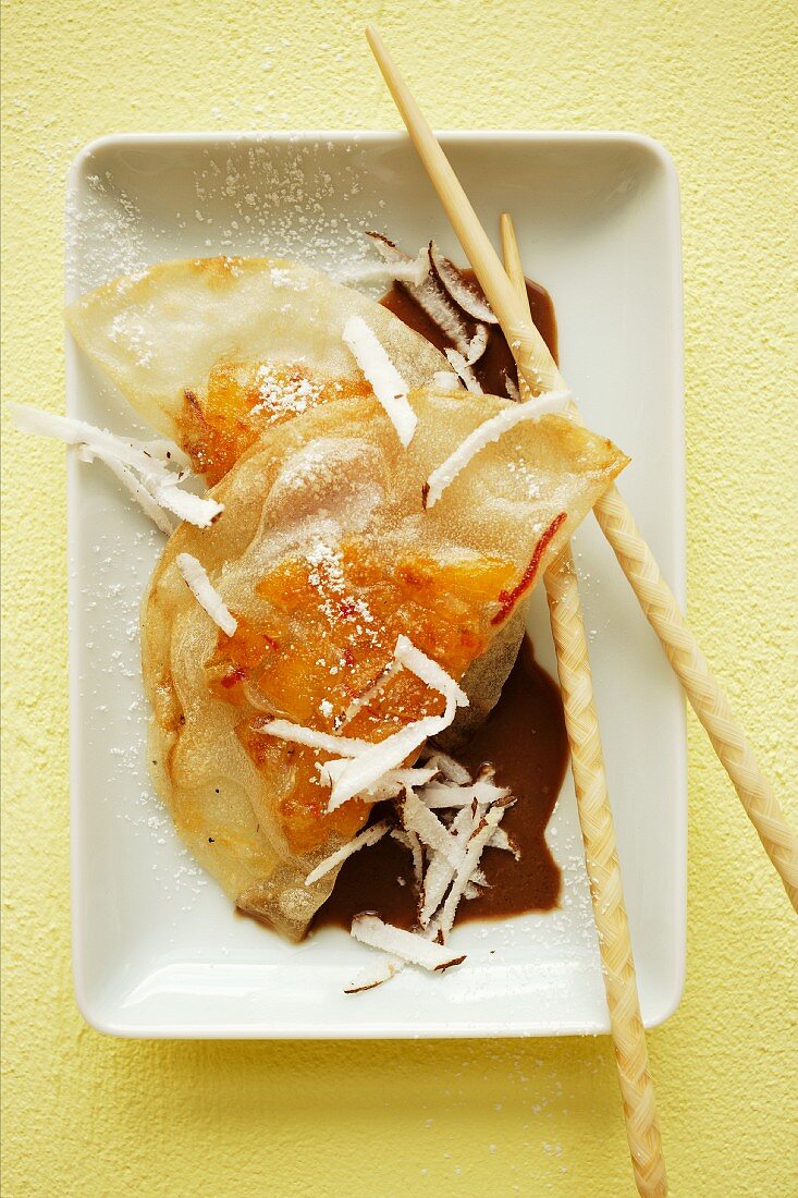 Deep-fried rice paper parcels with pineapple filling