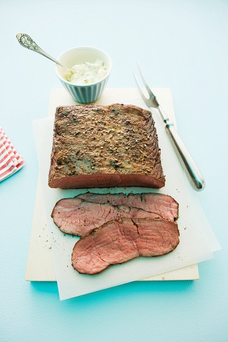 Roast beef, partly sliced