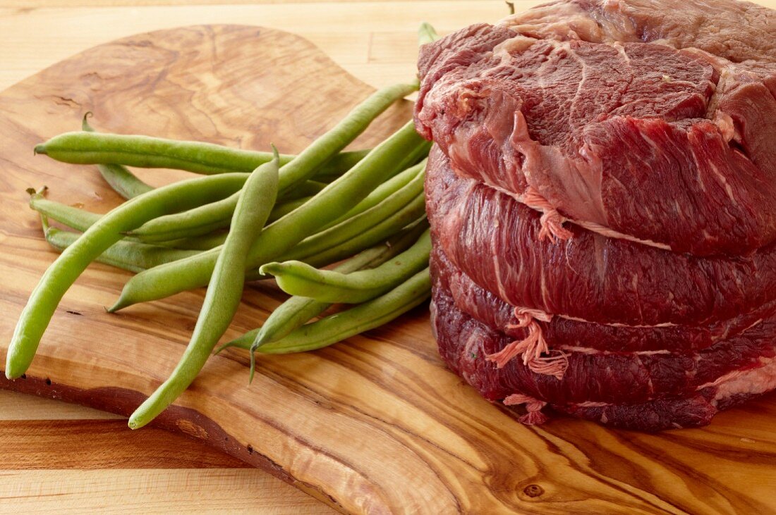 Raw Beef Tenderloin and Fresh Green Beans