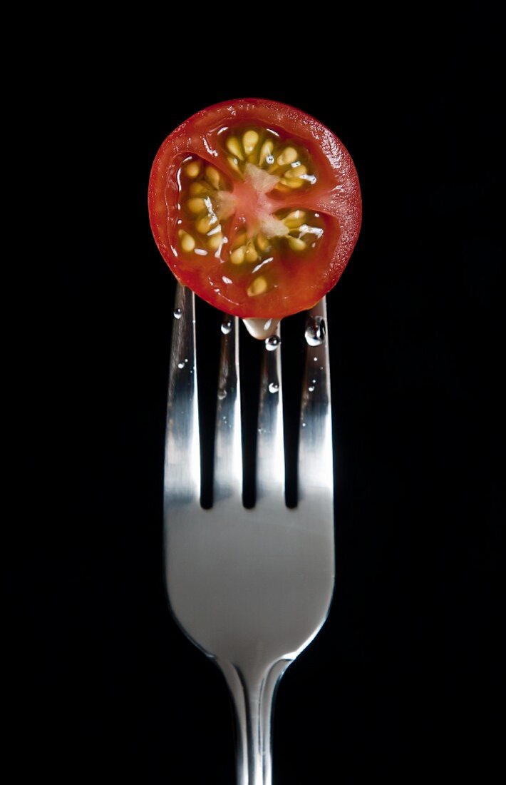 A Cherry Tomato on a Fork
