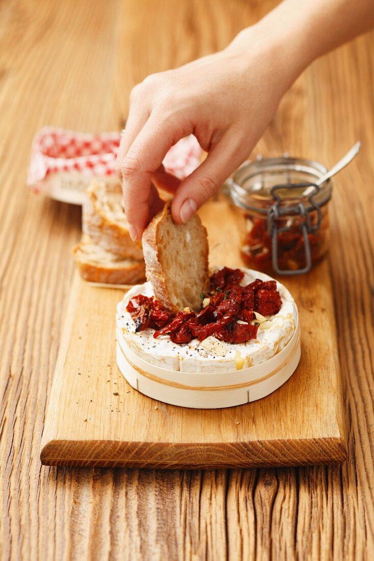Baked Camembert with sundried tomatoes and thyme