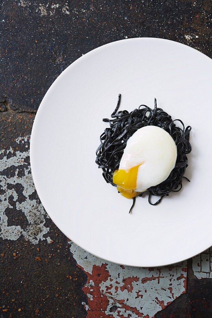 Squid ink pasta with slow poached egg