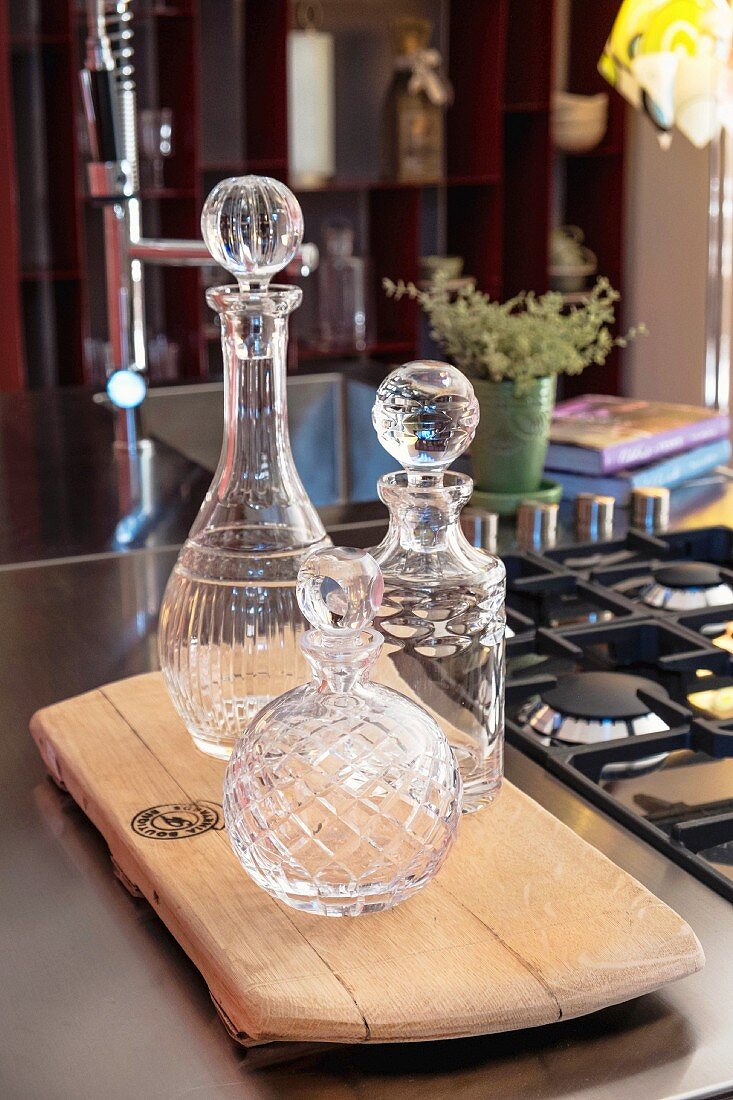 Empty decanters on wooden board