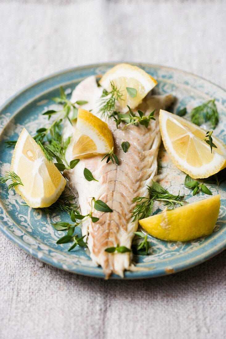 Bass cooked in a salt crust, with lemon, dill and thyme