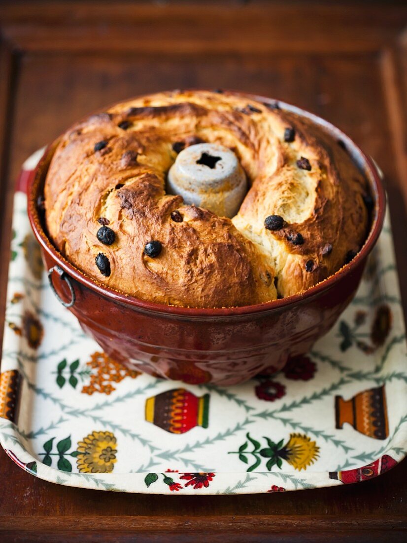 Bundt cake with raisins in a baking mould