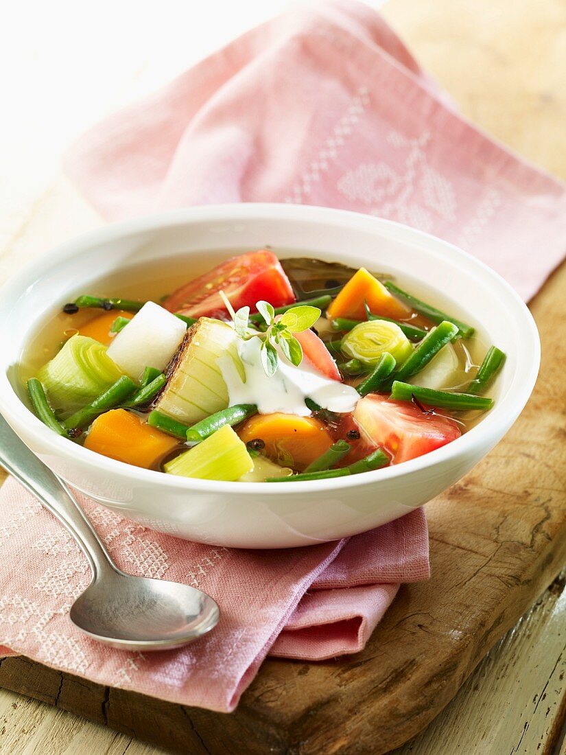 Vegetable soup with leek, carrots and tomatoes