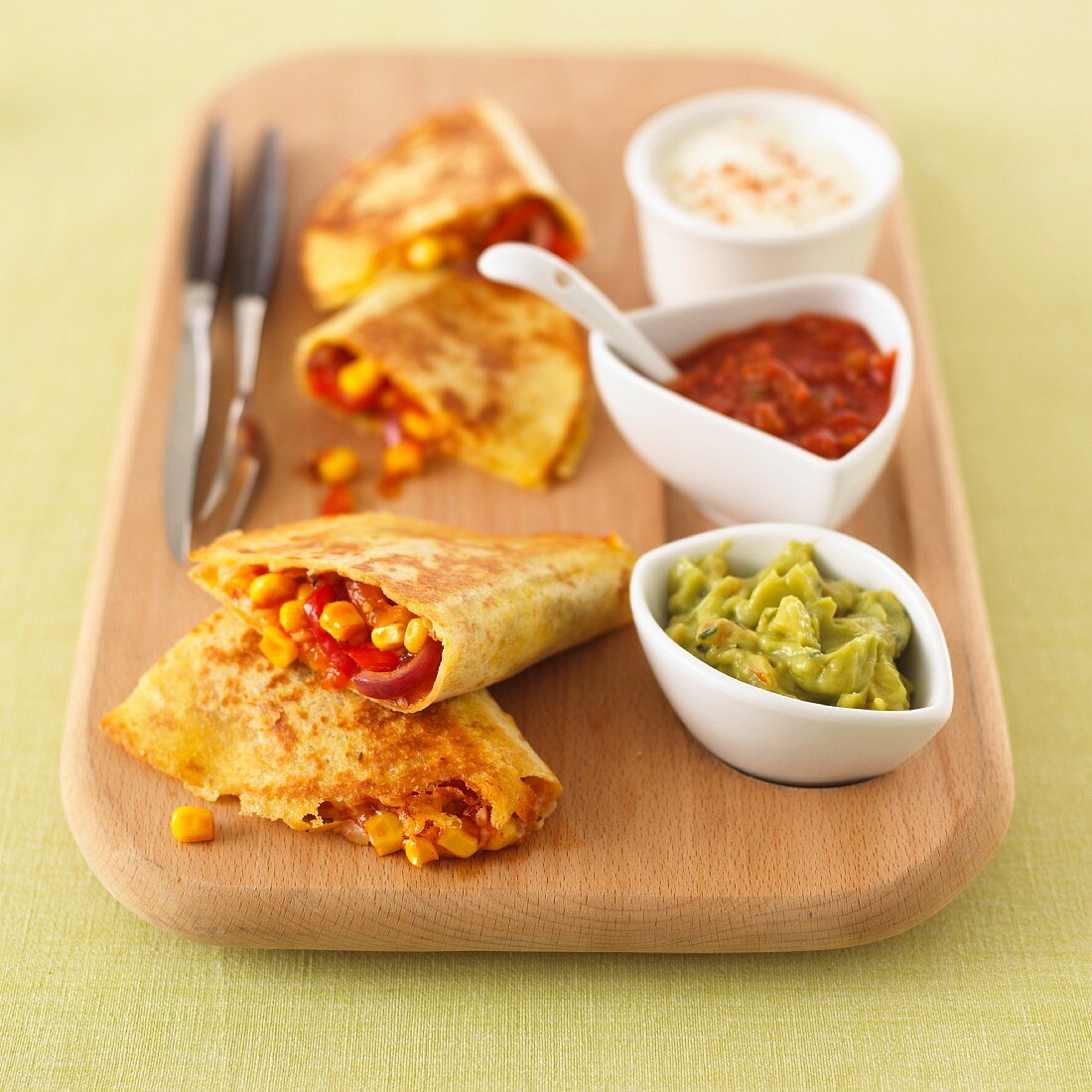 Quesadillas with sweetcorn filling and assorted dips