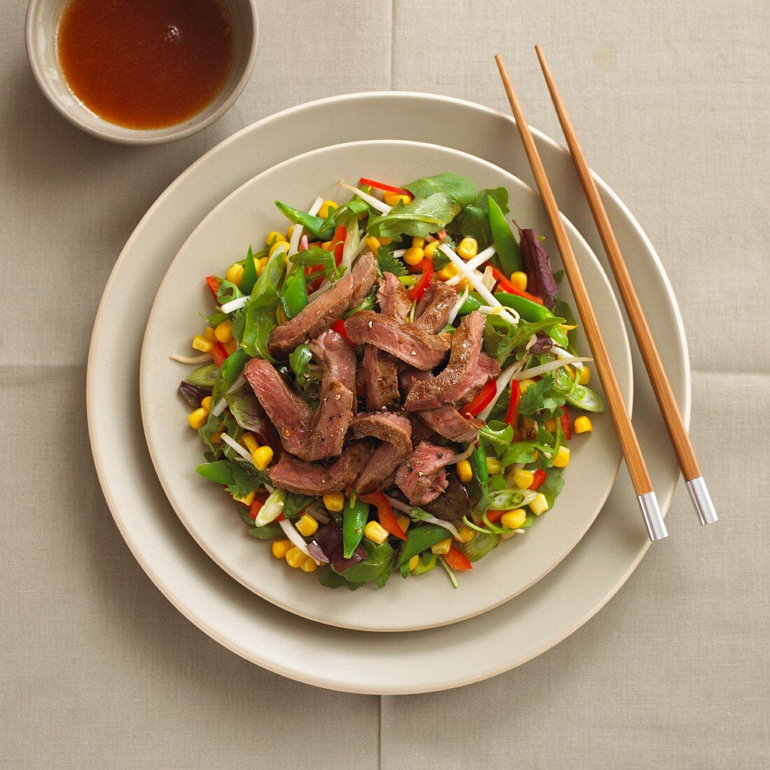 Teriyaki beef salad with sweetcorn and sugar snap peas