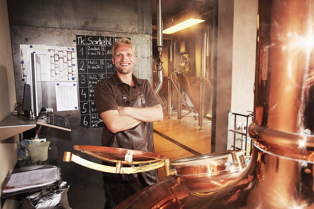 A worker in a brewery