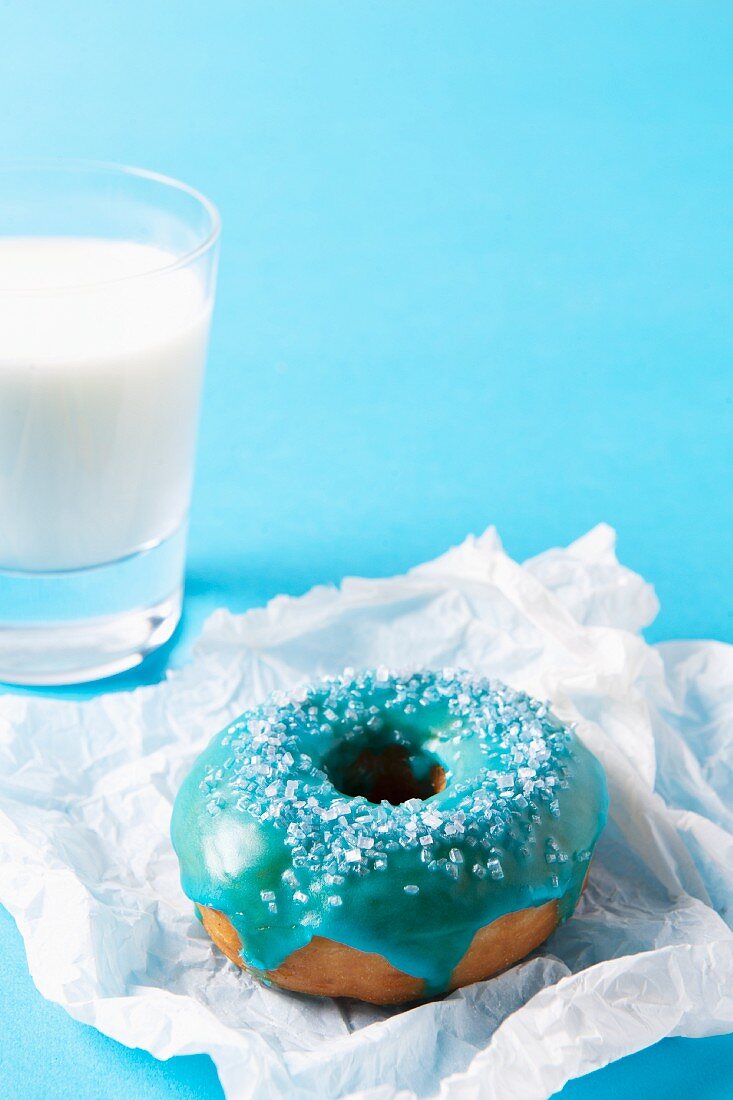 A doughnut with turquoise glac