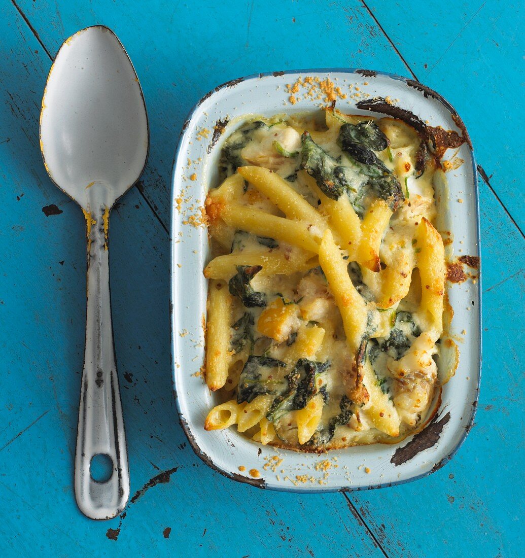 Pasta bake made with penne, haddock and spinach (view from above)